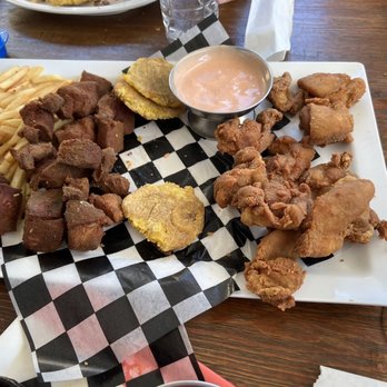 Rancho Playero - Sampler: fries, pork, plantains, chicken - Puerto Rican Near Me - Ponce, Puerto Rico Rancho Playero - Sampler: fries, pork, plantains, chicken - Puerto Rican Near Me - Ponce, Puerto Rico