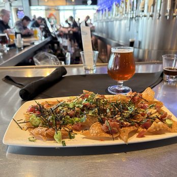 Yard House - Poke Nachos and House Amber Triple dark beer. - New American Near Me - San Jose, California Yard House - Poke Nachos and House Amber Triple dark beer. - New American Near Me - San Jose, California