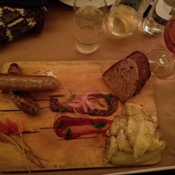 Vincent Restaurant - Sausage and sauerkraut with firestick flowers from Modesto and a rye Manhattan - New American Near Me - Chicago, Illinois Vincent Restaurant - Sausage and sauerkraut with firestick flowers from Modesto and a rye Manhattan - New American Near Me - Chicago, Illinois