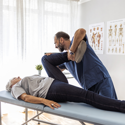 Sam Salas ,DC - Chiropractic & Acupuncture - Spinal and hip Exam, back pain and hip pain.