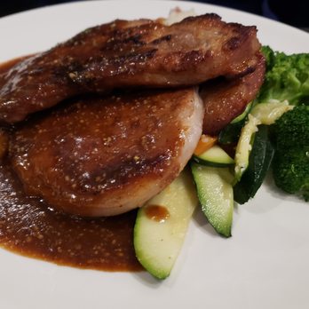 Dickens Restaurant - Grilled pork chop with honey mustard glaze - Steakhouses Near Me - Markham, Ontario