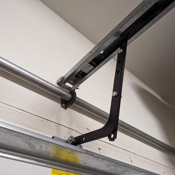 Express Garage & Gate Services - my broken spring housed inside the pipe - Garage Door Services Near Me - Costa Mesa, California