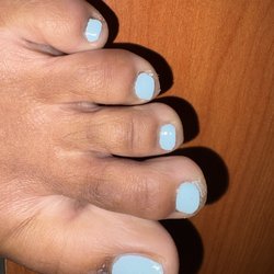 Nails by Lisa - Skin around nail just picked and peeled af. Polish not clean.