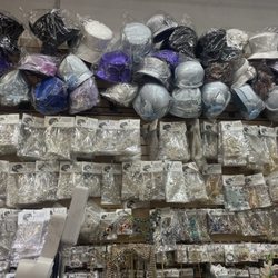 Jg Merchandise - Behind the register- don't worry, there is a whole room of hats in the back!