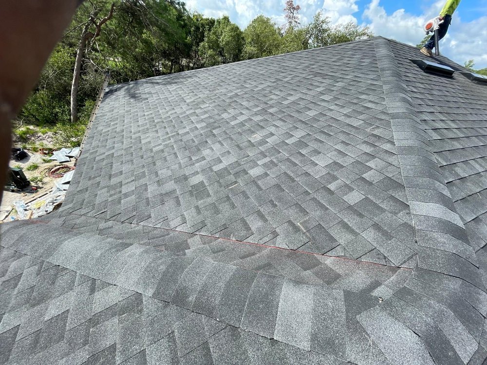 Slide of Osmin Roofing