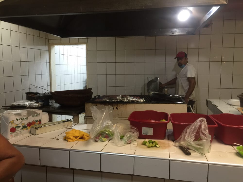 Asadero los Molcajetes Logo