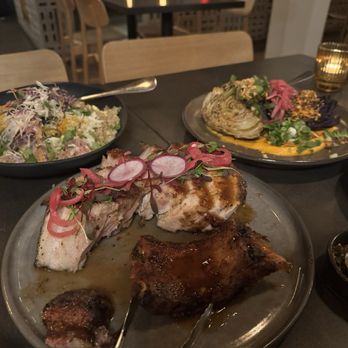 Vinai - From left: crabby fried rice, double cut pork chop, charred cabbage - New American Near Me - Minneapolis, Minnesota