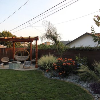 SB Turf & Landscape - a backyard with a swing - Landscaping Near Me - Santa Barbara, California