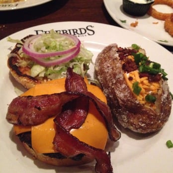 Firebirds Wood Fired Grill - Bacon cheeseburger with loaded potato - Steakhouses Near Me - Hoover, Alabama