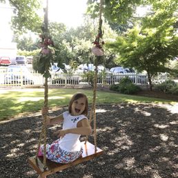 Fun time on the swing hanging from the big tree!