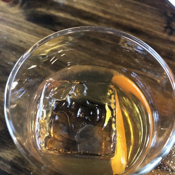 Yellow Rose Distilling - Old Fashioned with logo ice cube - Cocktail Bars Near Me - Houston, Texas Yellow Rose Distilling - Old Fashioned with logo ice cube - Cocktail Bars Near Me - Houston, Texas