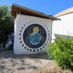The Temple Of Goddess Spirituality, Dedicated To Sekhmet - Art on one building.