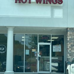 Rick's Hotwings - Rick's Hot Wings (parking lot view)