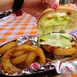 Smokin Momma’s Burgers & BBQ - Smash burger with pulled pork, an onion ring, BBQ, mayo and lettuce.