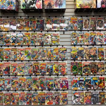 Coliseum of Comics - Wall of highlight comics - Comic Books Near Me - Orlando, Florida Coliseum of Comics - Wall of highlight comics - Comic Books Near Me - Orlando, Florida