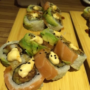 Sushi Go - Roll #30: seafood rolled in fresh salmon and avocado - Sushi Bars Near Me - Cancún, ROO Sushi Go - Roll #30: seafood rolled in fresh salmon and avocado - Sushi Bars Near Me - Cancún, ROO