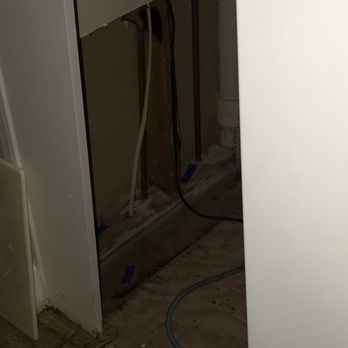 Floodmasters - Behind fridge - General Contractors Near Me - Norcross, Georgia Floodmasters - Behind fridge - General Contractors Near Me - Norcross, Georgia