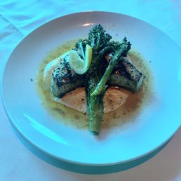 This is a cobia fillet with potatoes and broccoli.