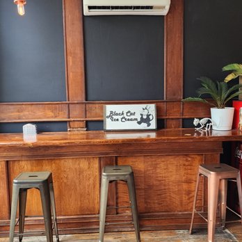 Black Cat Ice Cream - a bar with stools - Ice Cream & Frozen Yogurt Near Me - Des Moines, Iowa Black Cat Ice Cream - a bar with stools - Ice Cream & Frozen Yogurt Near Me - Des Moines, Iowa