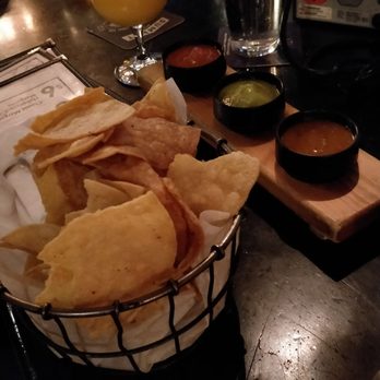Pajarito - Chips and salsa. Pineapple passion fruit slushie in the back. - Mexican Near Me - Saint Paul, Minnesota Pajarito - Chips and salsa. Pineapple passion fruit slushie in the back. - Mexican Near Me - Saint Paul, Minnesota