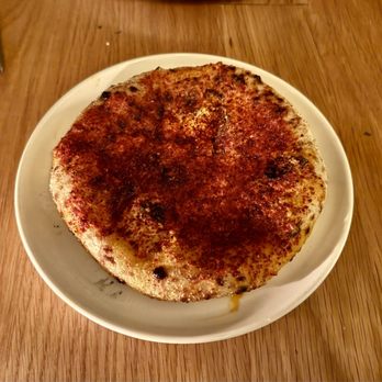 Rolo's - Calabrian Chili Butter Wood-Fired Polenta Bread - Sandwiches Near Me - Ridgewood, New York Rolo's - Calabrian Chili Butter Wood-Fired Polenta Bread - Sandwiches Near Me - Ridgewood, New York