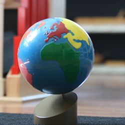 Seedsowers Montessori - Montessori globe with vivid colors, teaching geography and continents at Seedsowers Montessori Preschool in Temecula.