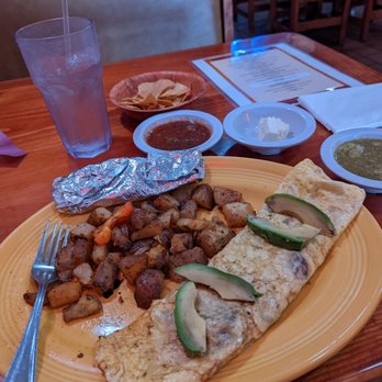 La Parrilla - Farmers omelette w/ avo, potatoes, tortilla & many sauces available including the chips and salsa. Delicious or delicioso - Mexican Near Me - Ventura, California La Parrilla - Farmers omelette w/ avo, potatoes, tortilla & many sauces available including the chips and salsa. Delicious or delicioso - Mexican Near Me - Ventura, California