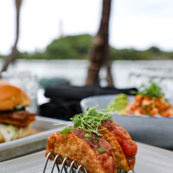 Lucky Shuck - Salmon Poke Tacos: Dynamite Aïoli, Guacamole, Truffle, Eel Sauce - Seafood Near Me - Jupiter, Florida Lucky Shuck - Salmon Poke Tacos: Dynamite Aïoli, Guacamole, Truffle, Eel Sauce - Seafood Near Me - Jupiter, Florida