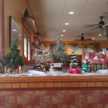 Busy Corner - Christmas holiday decor put up around the whole restaurant like little dioramas - American Near Me - Goodfield, Illinois
