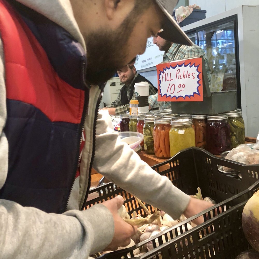 My boyfriend George, buying some fresh garlic. My boyfriend George, buying some fresh garlic.
