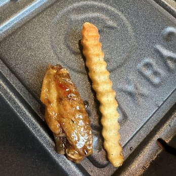 Zaxbys - Wing size compared next to a fry - Fast Food Near Me - Orlando, Florida