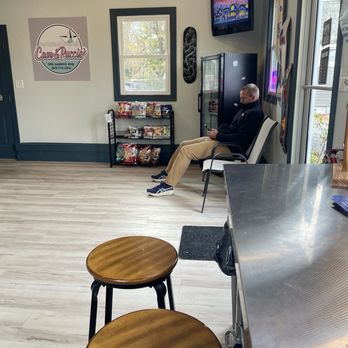 Cam & Pucci's - Small table with stools and waiting area - Cheesesteaks Near Me - North Cape May, New Jersey Cam & Pucci's - Small table with stools and waiting area - Cheesesteaks Near Me - North Cape May, New Jersey