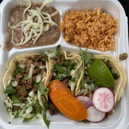 asada taco plate and a horchata. asada taco plate and a horchata.