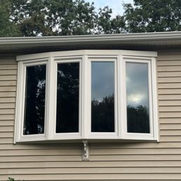 Bow window with wood and fiberglass trim!