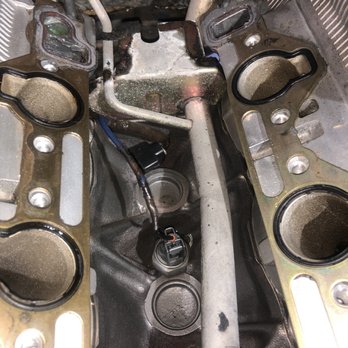Sureway Automotive & Machine - Notice the sensor lying in the void beneath the intake manifold? - Auto Repair Near Me - Kingman, Arizona Sureway Automotive & Machine - Notice the sensor lying in the void beneath the intake manifold? - Auto Repair Near Me - Kingman, Arizona