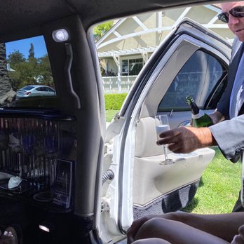 Vintage Limousine Service - Eric pouring bubbles - Limos Near Me - Lodi, California Vintage Limousine Service - Eric pouring bubbles - Limos Near Me - Lodi, California
