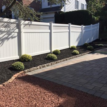 ET Landscaping - a white vinyl fence and landscaping - Landscaping Near Me ET Landscaping - a white vinyl fence and landscaping - Landscaping Near Me