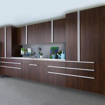 Garage Kings - a modern kitchen with wood cabinets and stainless steel appliances - Flooring Near Me Garage Kings - a modern kitchen with wood cabinets and stainless steel appliances - Flooring Near Me