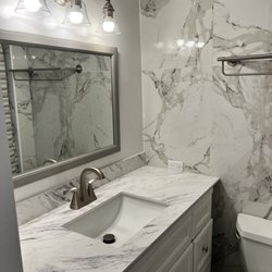 Antonio Tile - New sink, cabinet, faucets, mirror and lights!