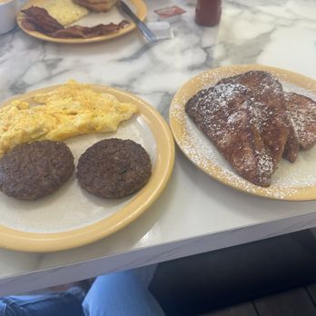 The Cozy Griddle - Griddle French Toast, scrambled eggs with cheese, two sausage patties - Breakfast & Brunch Near Me - Baton Rouge, Louisiana The Cozy Griddle - Griddle French Toast, scrambled eggs with cheese, two sausage patties - Breakfast & Brunch Near Me - Baton Rouge, Louisiana