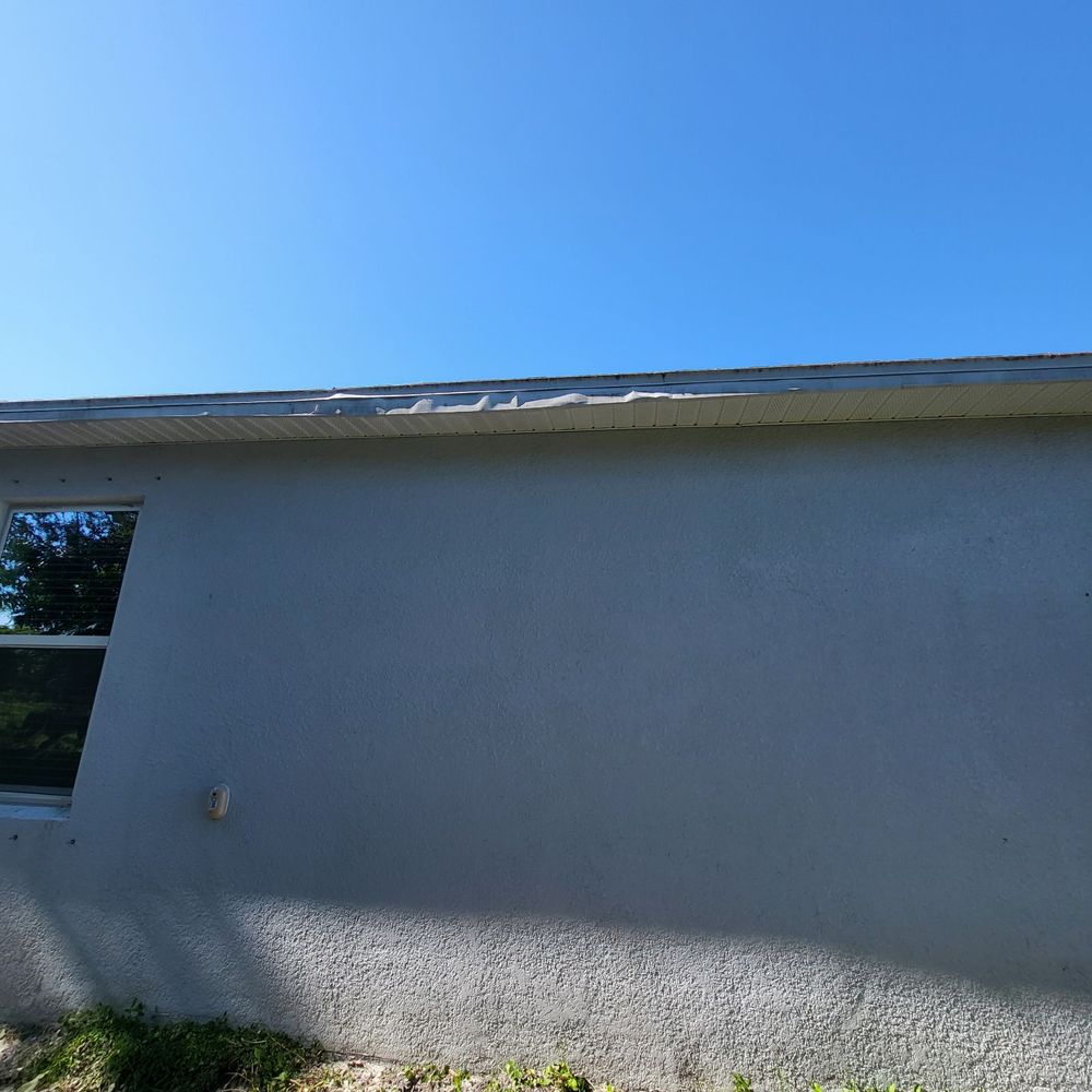 P.k. Tree service - Damage to roof caused by trunk dropped on roof (image 1). - Tree Services Near Me