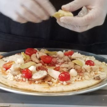 The Pizza Press - Celebration - Adding Artichokes to my pizza! - Pizza Near Me - Kissimmee, Florida The Pizza Press - Celebration - Adding Artichokes to my pizza! - Pizza Near Me - Kissimmee, Florida