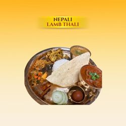 Bombay To Kathmandu - A wholesome Nepali meal featuring Basmati rice, lentil soup, seasonal veg curry, Nepali-style lamb curry, achar (pickles), desert and fresh