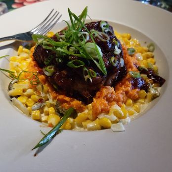 The Depot Restaurant - Southern Comfort - pork w/barbecue sauce served on smashed sweet potatoes and jalapeno creamed corn. - New American Near Me - Seaview, Washington The Depot Restaurant - Southern Comfort - pork w/barbecue sauce served on smashed sweet potatoes and jalapeno creamed corn. - New American Near Me - Seaview, Washington