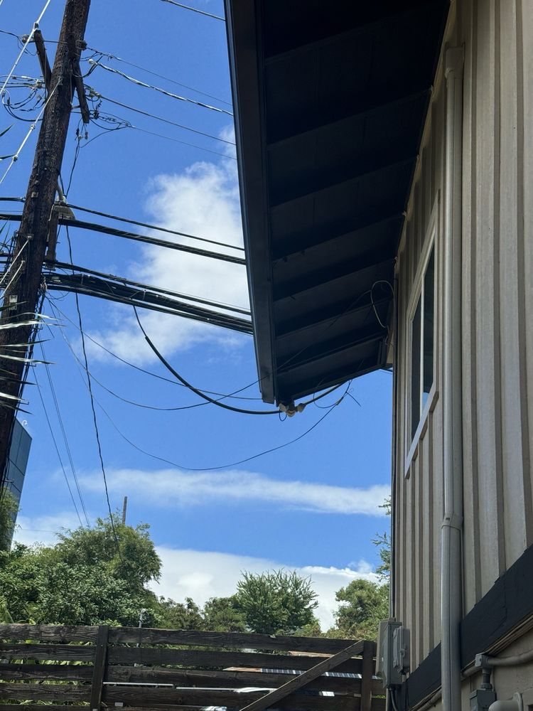 Slide of J&E ROOFING