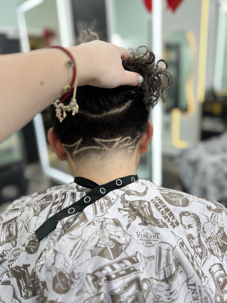 Adela’s Beauty and Barbershop Logo