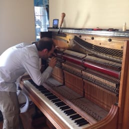 "The piano whisperer" in action. "The piano whisperer" in action.