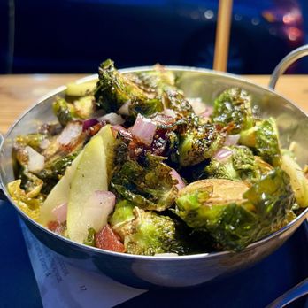 The Hideout Kitchen - Roasted "Shaved" Brussels Sprouts in a pancetta, shallot, and Granny Smith apple vinaigrette. Delicious, but not shaved. Halved. - New American Near Me - Lafayette, California The Hideout Kitchen - Roasted "Shaved" Brussels Sprouts in a pancetta, shallot, and Granny Smith apple vinaigrette. Delicious, but not shaved. Halved. - New American Near Me - Lafayette, California