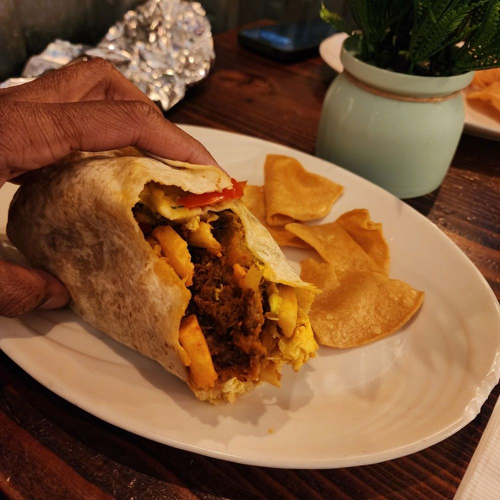 Maya Taqueria - Prospect Heights - Breakfast burrito interior - Mexican Near Me - Brooklyn, New York Maya Taqueria - Prospect Heights - Breakfast burrito interior - Mexican Near Me - Brooklyn, New York
