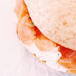 Les Bagels - Black pepper truffle cream cheese + smoked salmon on whole wheat bagel.